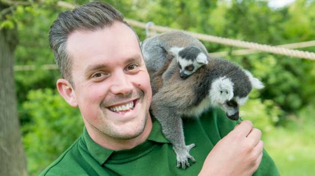Keeper Graeme with lemurs