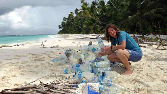 Heather Koldewey with the plastic found washed up on a Chagos beach