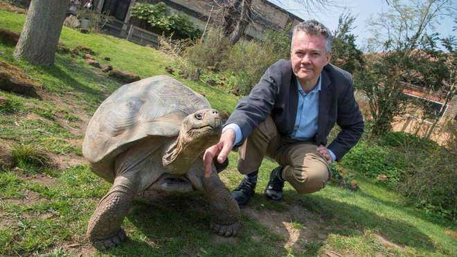 Ralph Armond with Galapagos giant tortoise