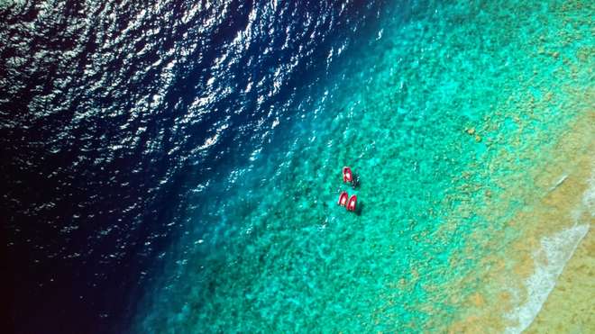 Tenders on reef for dives in BIOT