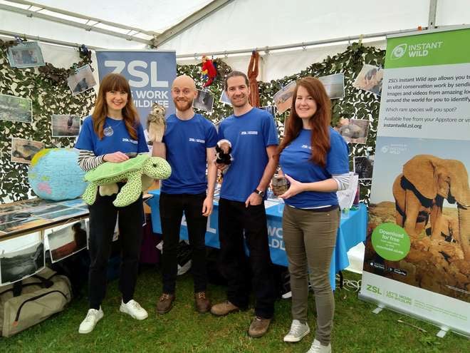 Photo - Rachael and Kate, with other ZSL staff, by their stand at the Festival of Nature in Bristol.