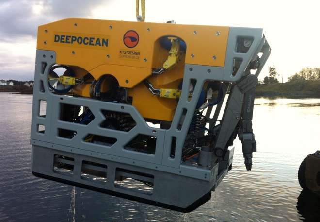 Photo of the remotely operated vehicle- a large piece of equipment, the size of a small car.