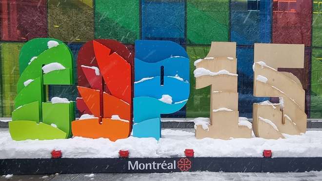 The COP15 sign in the snow